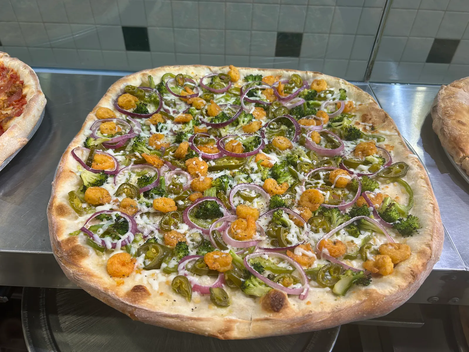 Shrimp and broccoli specialty pizza at Antonio's Amherst