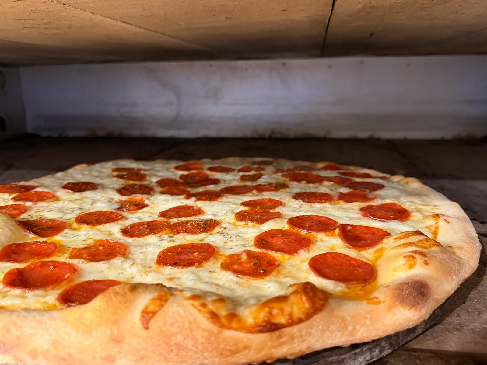 Whole pepperoni pizza at Antonio's Pizza Amherst