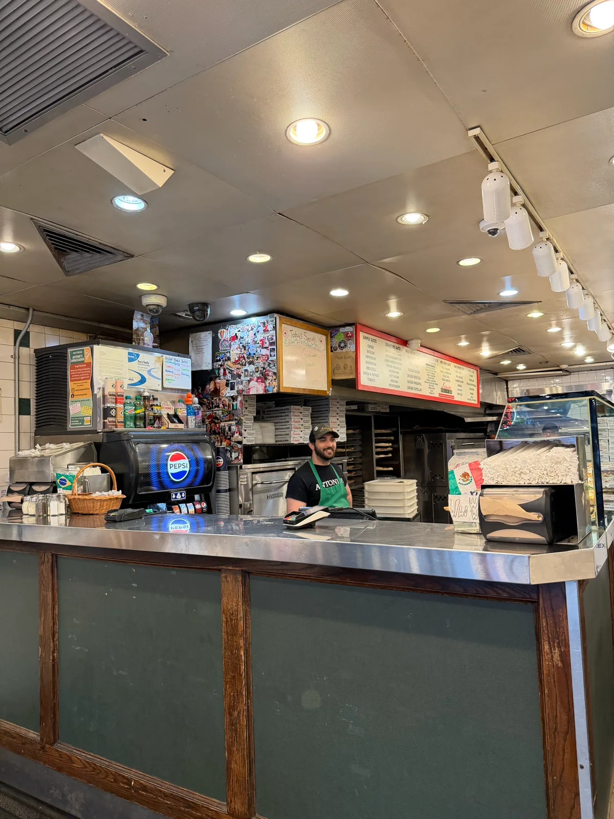 Antonio's Pizza Amherst team member at the order counter