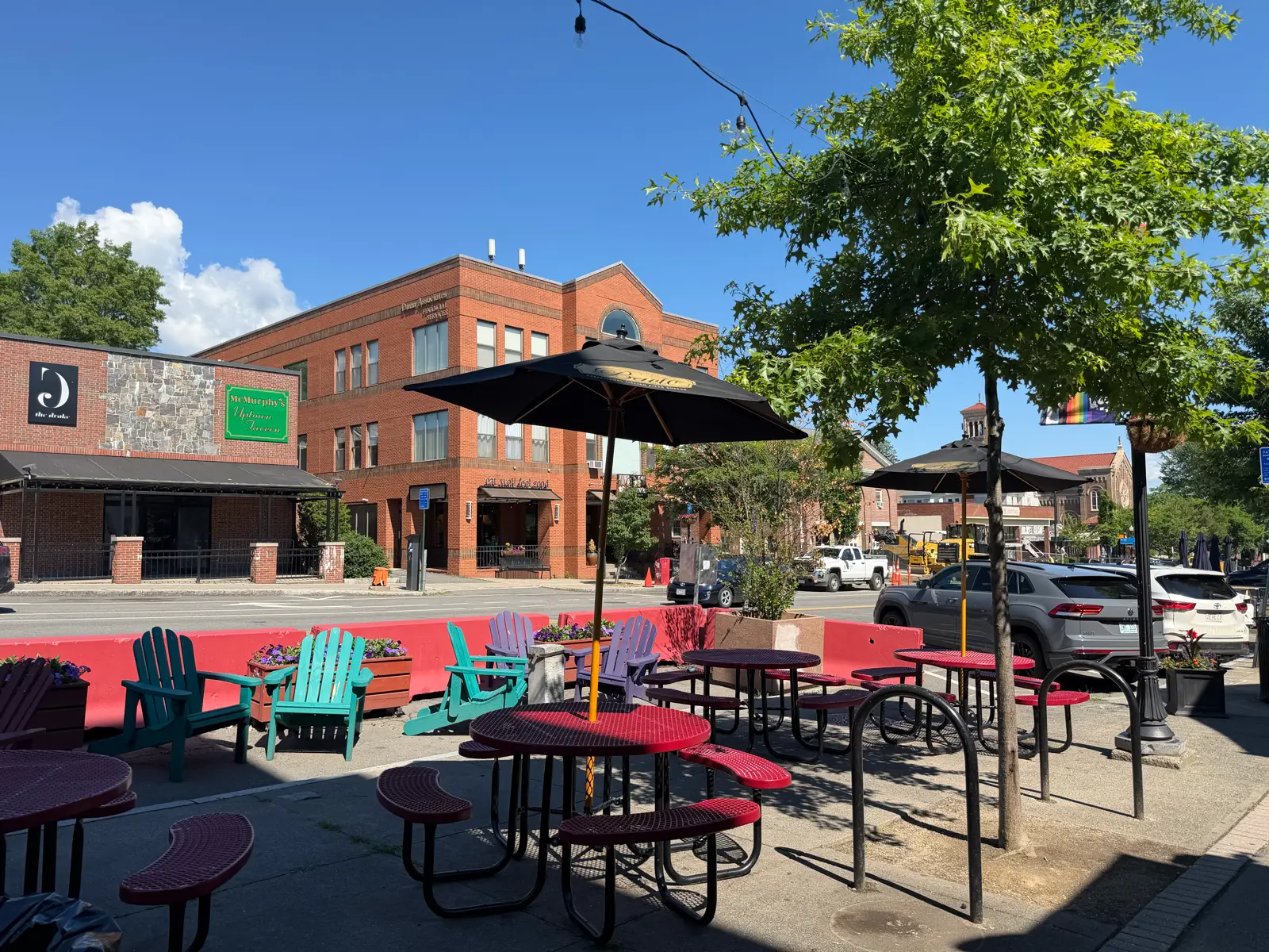 Outdoor patio seating on a summer day at Antonio's Pizza Amherst