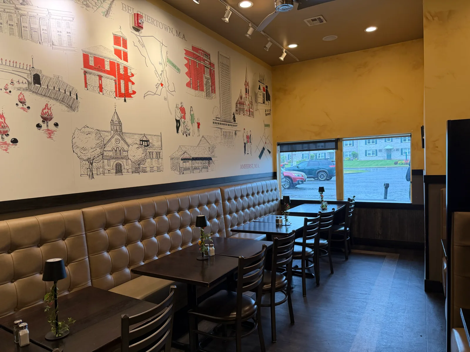Antonio's Pizza Belchertown dining room with a local Belchertown landmarks mural