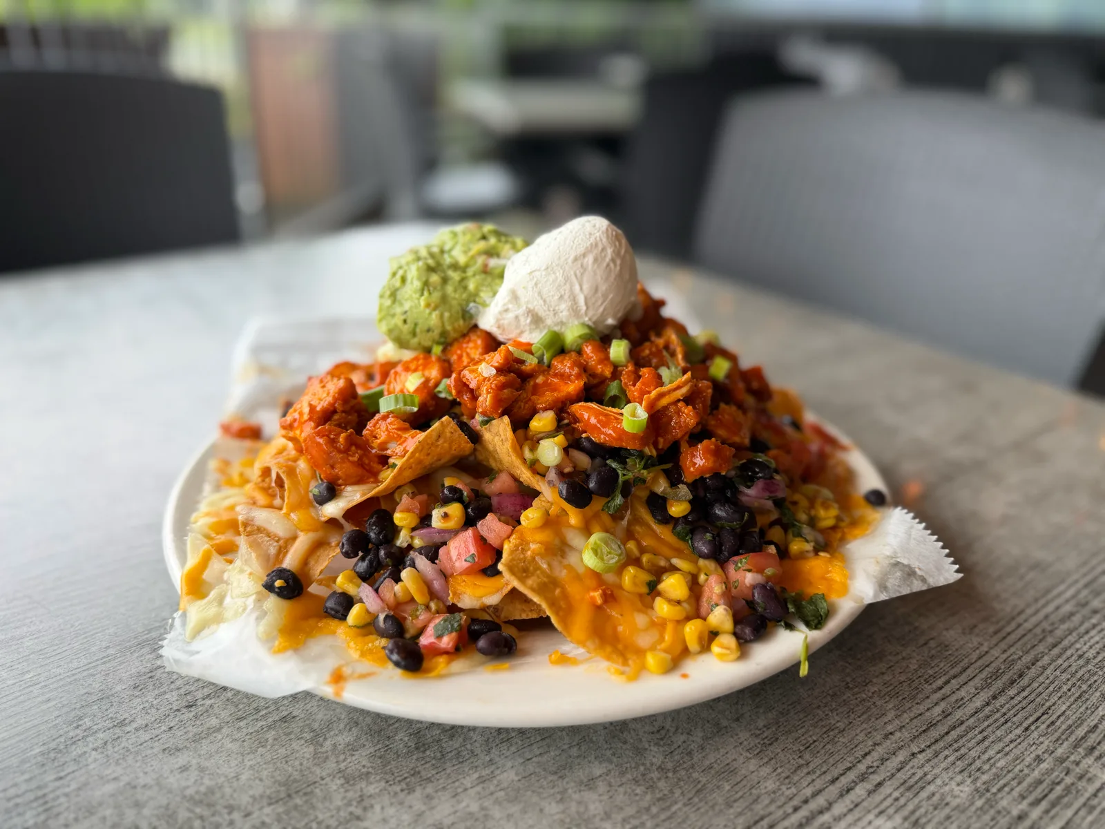 Buffalo chicken nachos with mozzarella, bacon, scallions, Colby Jack and blue cheese at Antonio's Pizza Belchertown