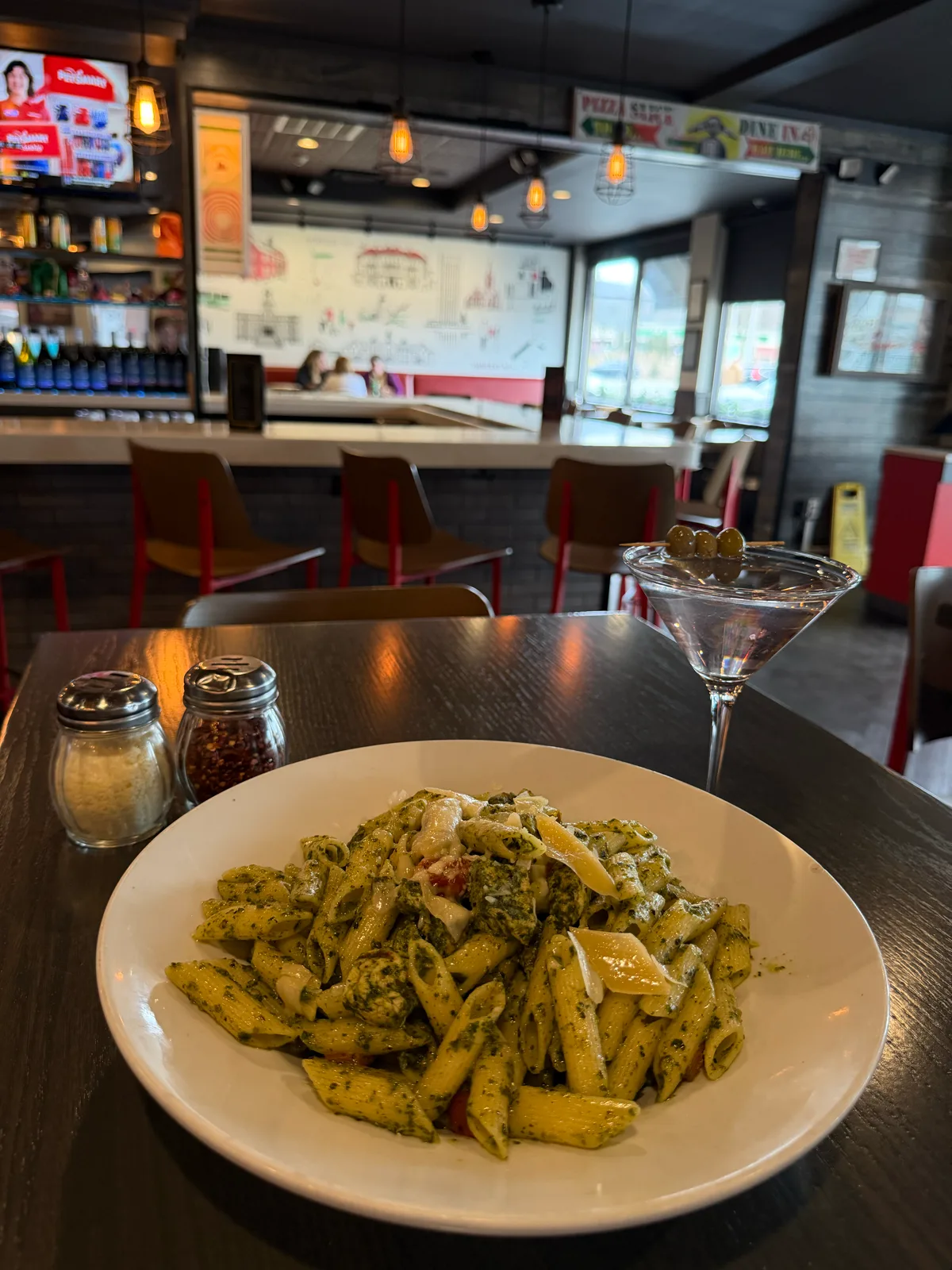 Pesto penne and a martini at the bar at Antonio's Pizza Newport
