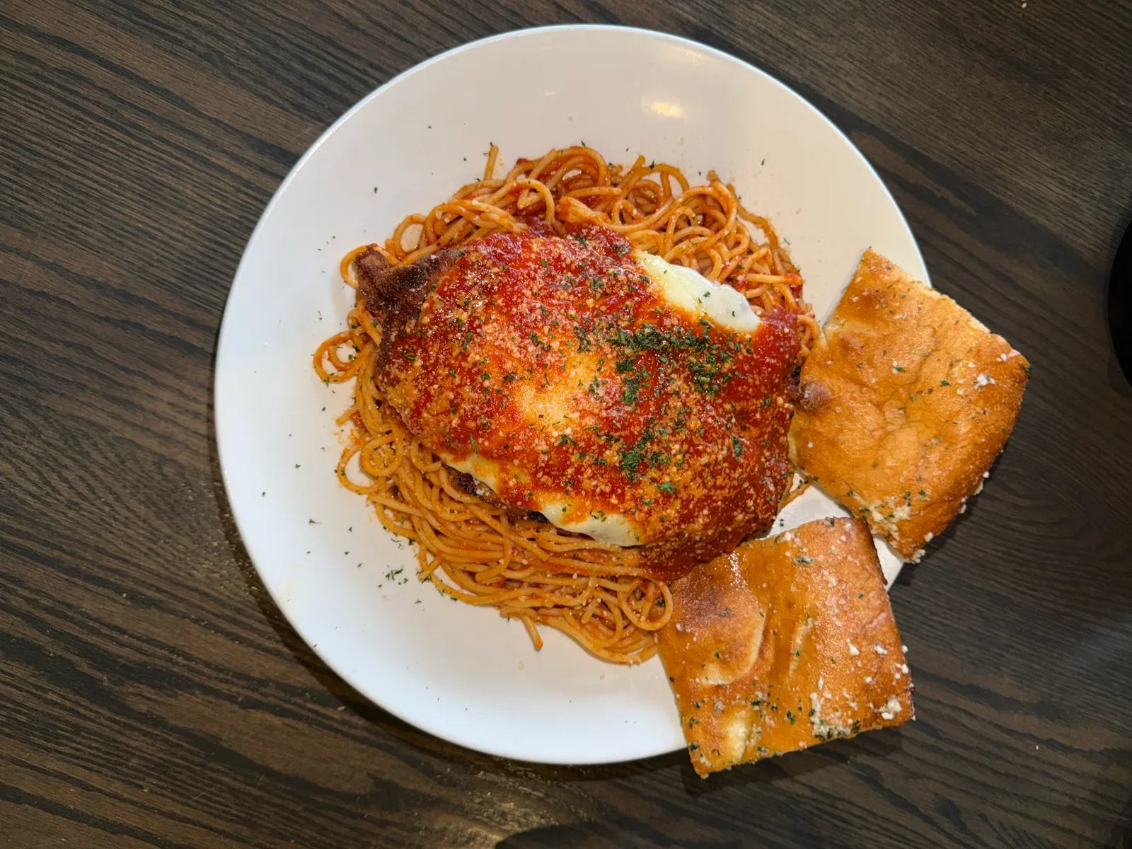 Chicken parmesan over spaghetti at Antonio's Pizza Newport