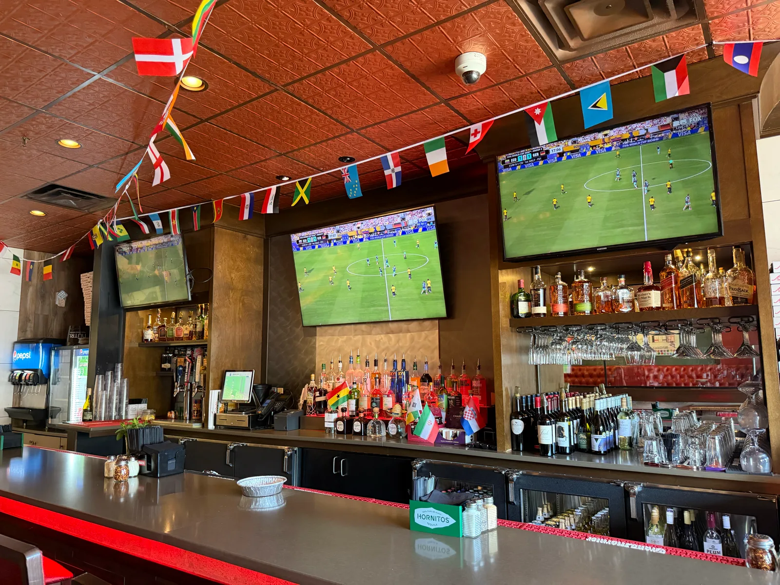 Full bar with sports TVs at Antonio's Pizza Pawtucket