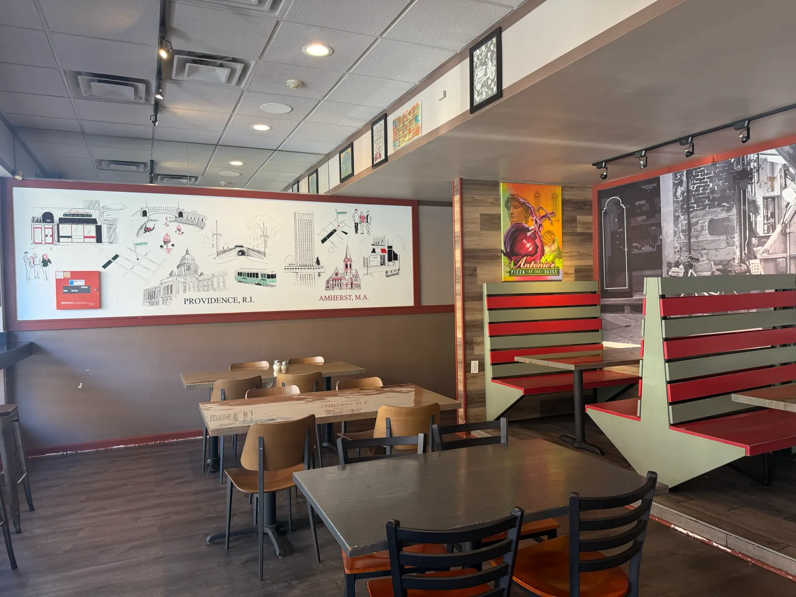 Dining room with the Providence and Amherst landmarks mural at Antonio's Thayer Street