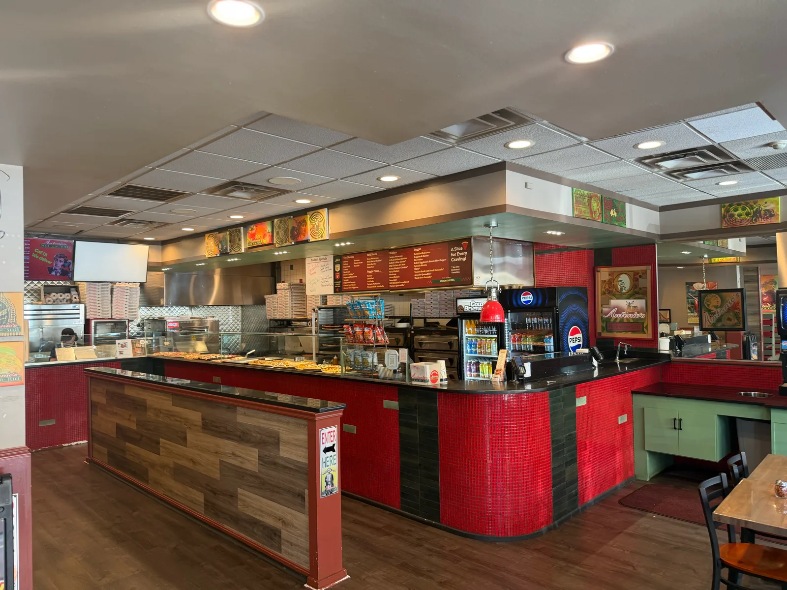 Order counter and menu boards at Antonio's Pizza Thayer Street