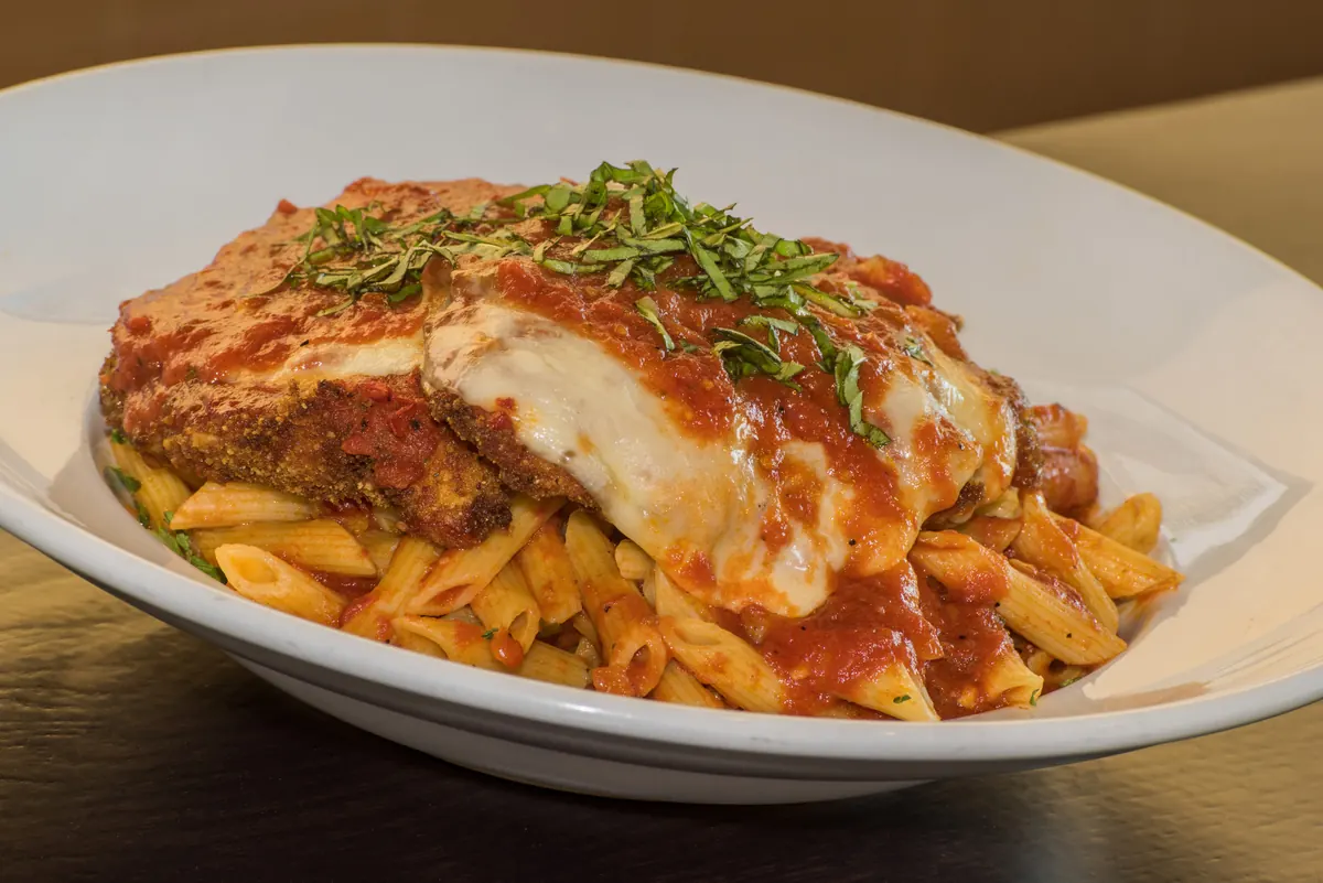 Antonio's chicken parmesan over pasta